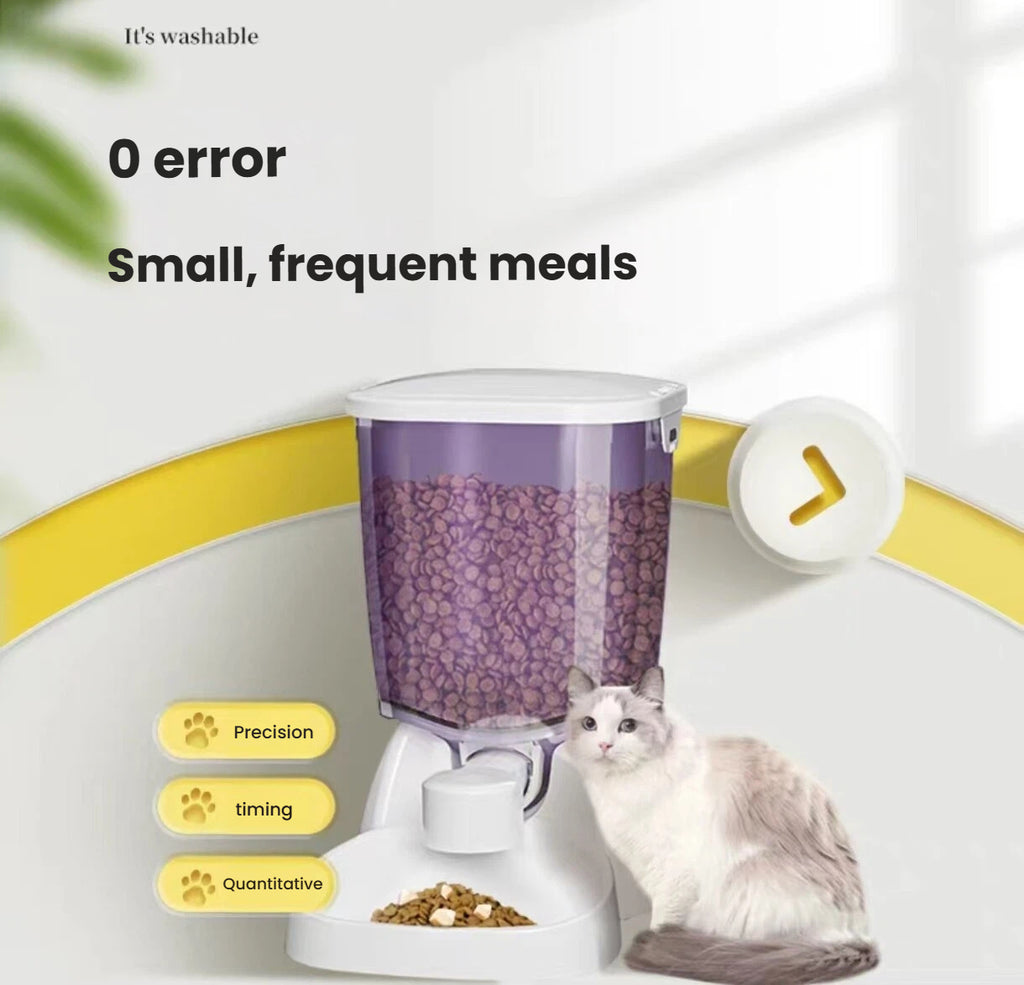Cat beside the CatMate automatic portion-control pet feeder