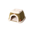 Petstar green heated cat house with cream trim and an arched front entrance