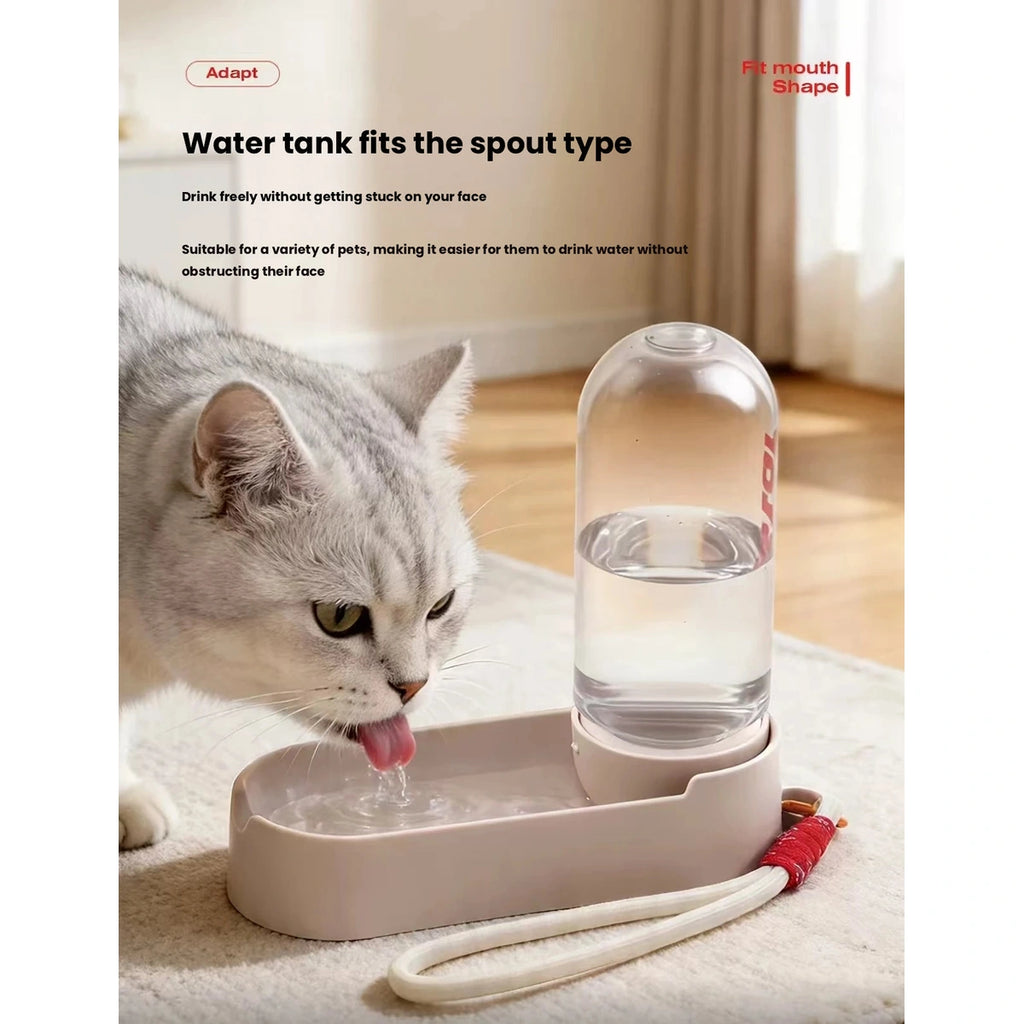 Cat drinking from the Petstar travel water bottle bowl