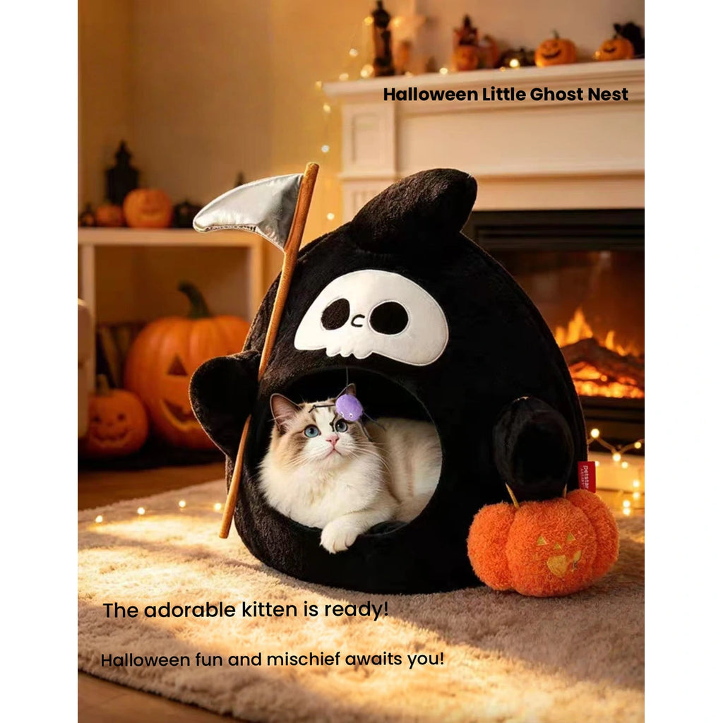 Cat resting inside the Petstar Halloween cave bed