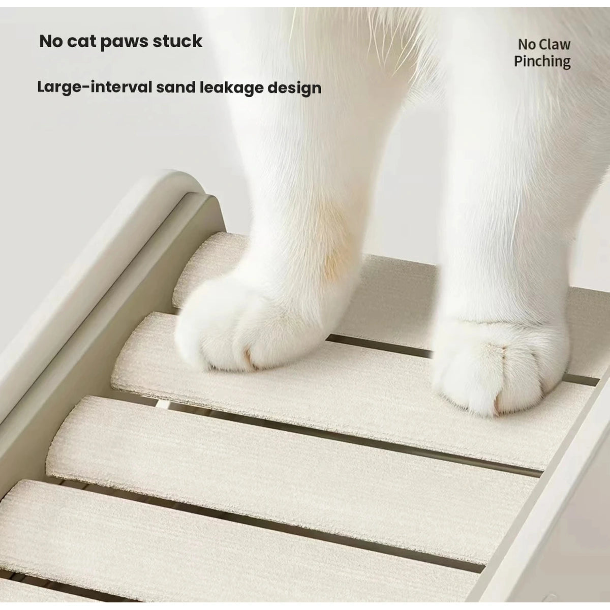 Close-up of cat paws on the slatted litter ramp