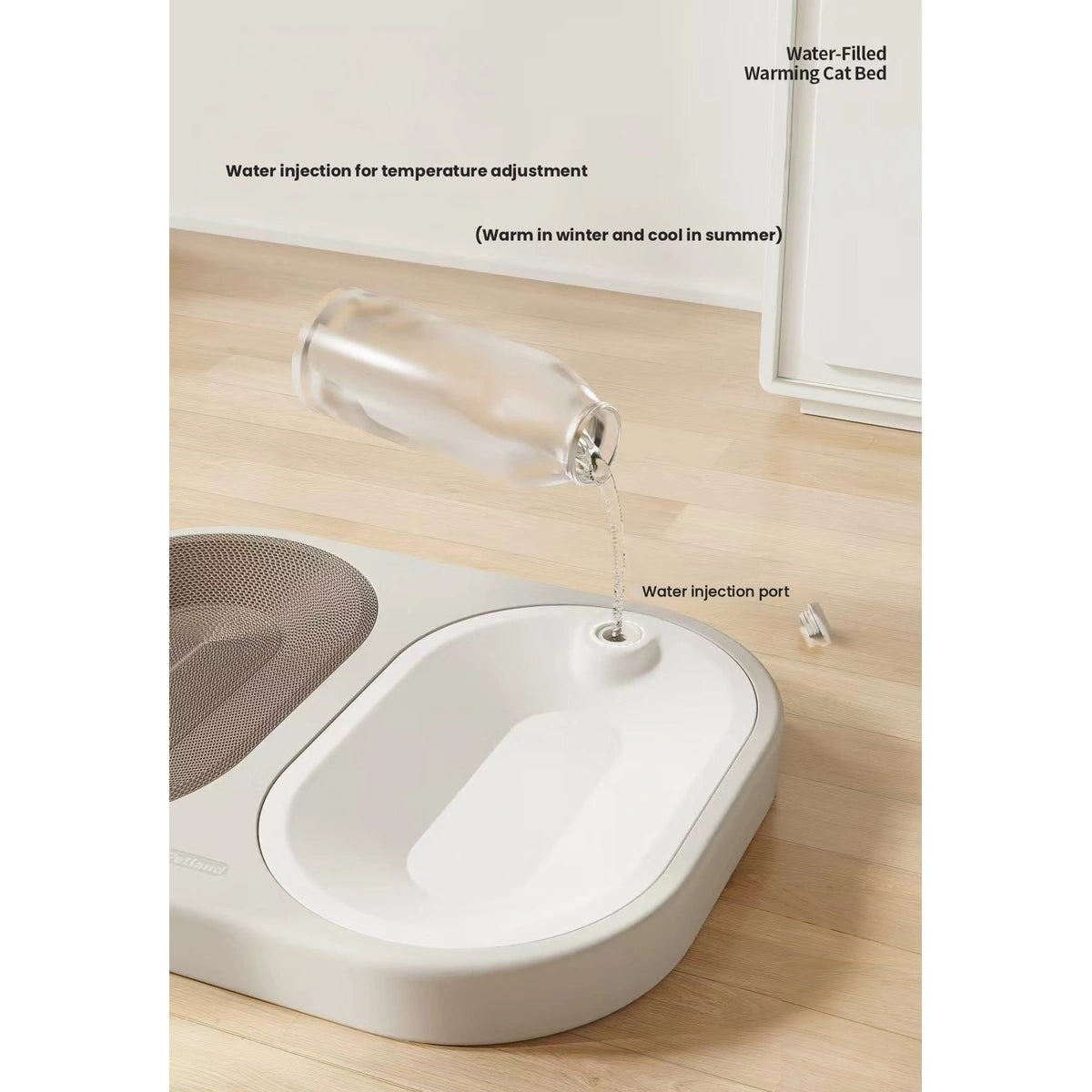 Water being poured into the cat bed panel through its fill port