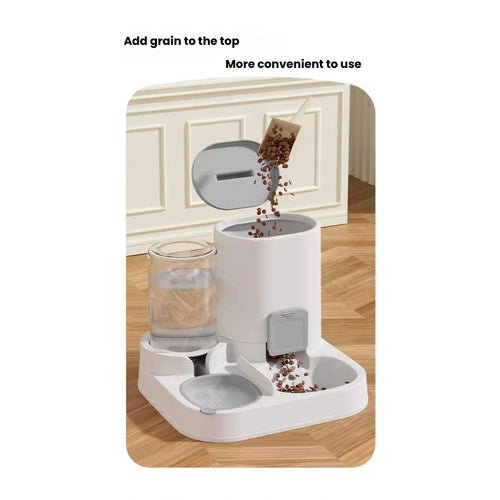 Cat eating from the grey gravity food and water set