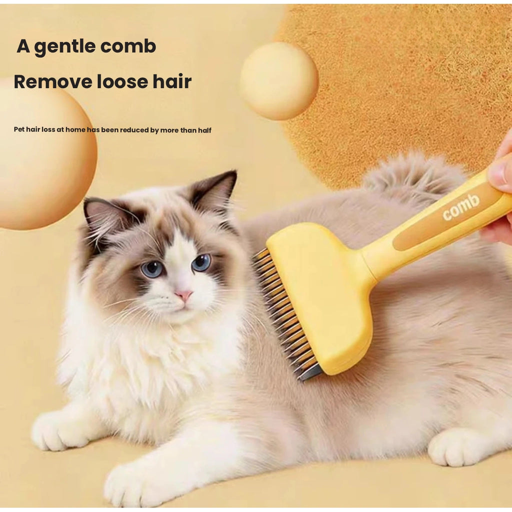 Cat being groomed with the yellow detangling comb
