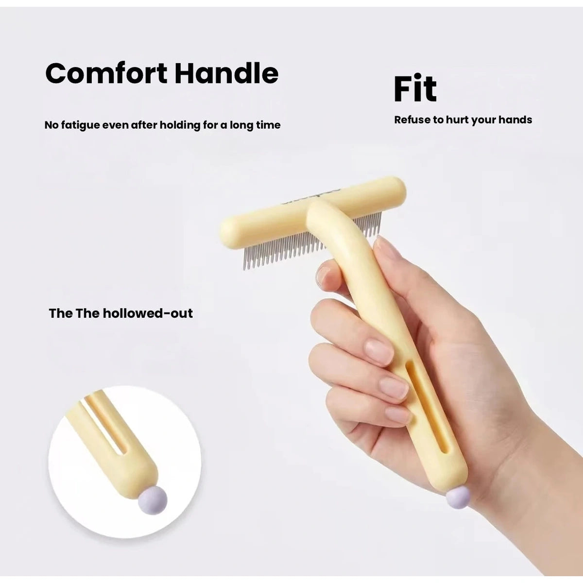 Hand holding yellow double-row grooming rake