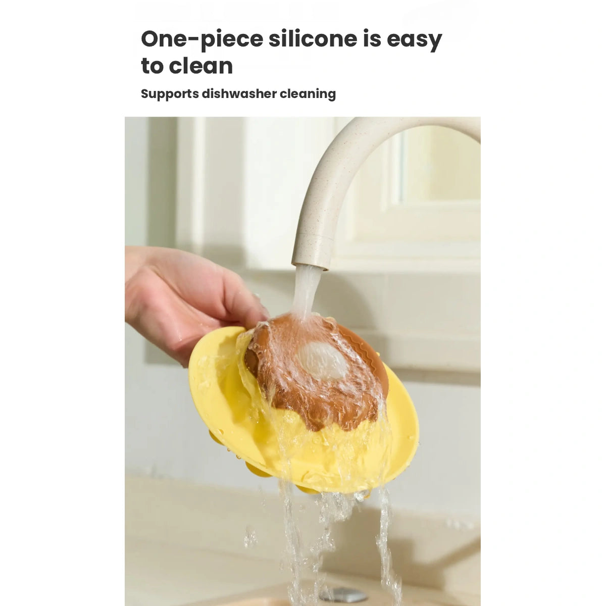 Yellow silicone lick bowl rinsed under tap