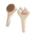 White paw-shaped cat grooming brush