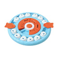Blue circular dog treat puzzle with movable white pieces