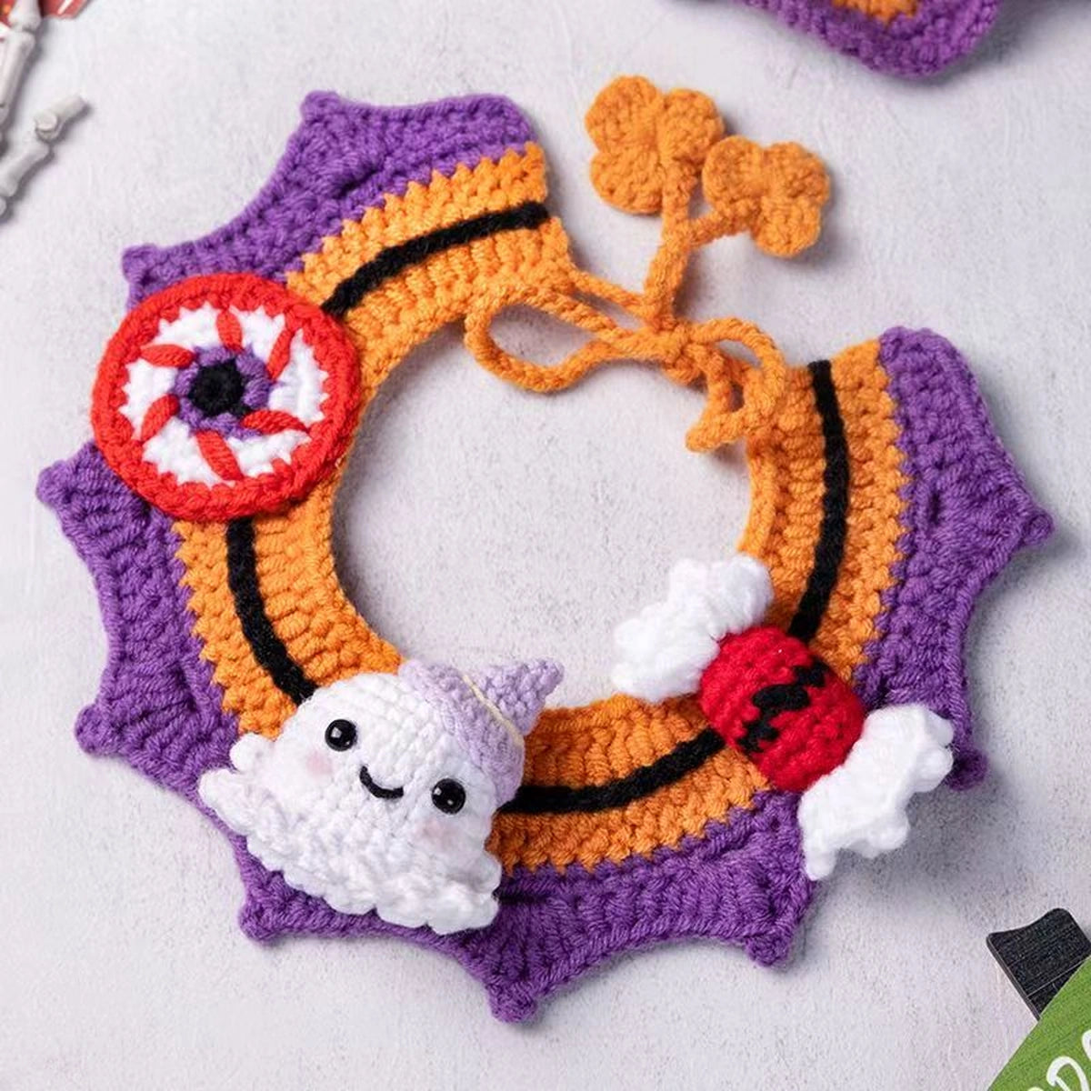 Purple ghost crochet pet collar laid flat