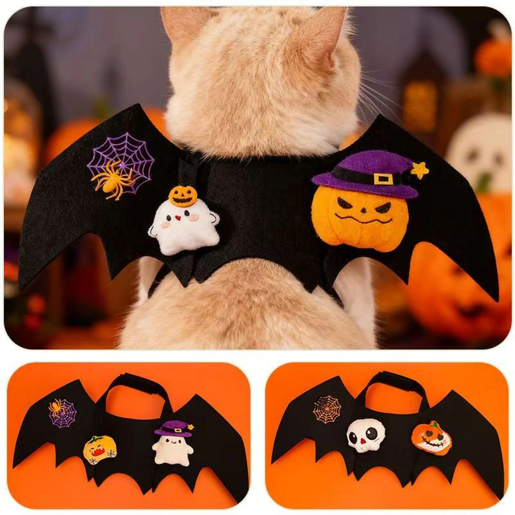 Cat wearing black bat wings with pumpkin and ghost motifs