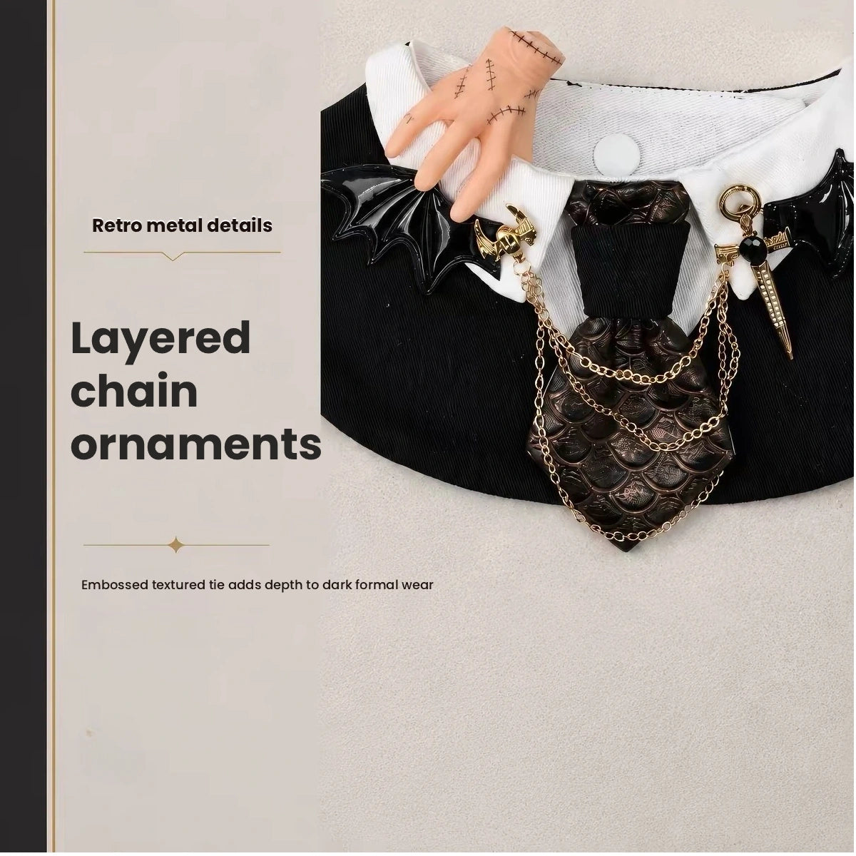 Close view of layered chains on black pet bib