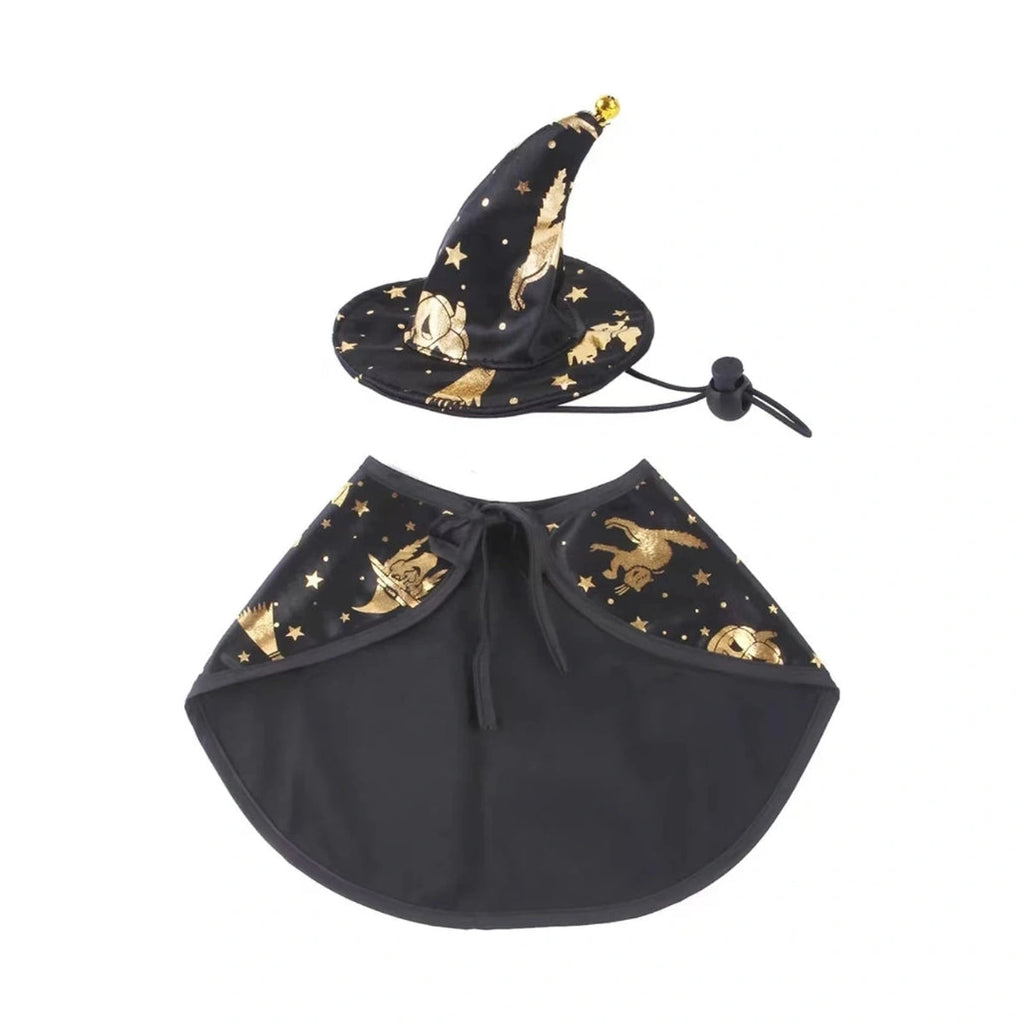 Black witch hat and cape costume pieces laid flat