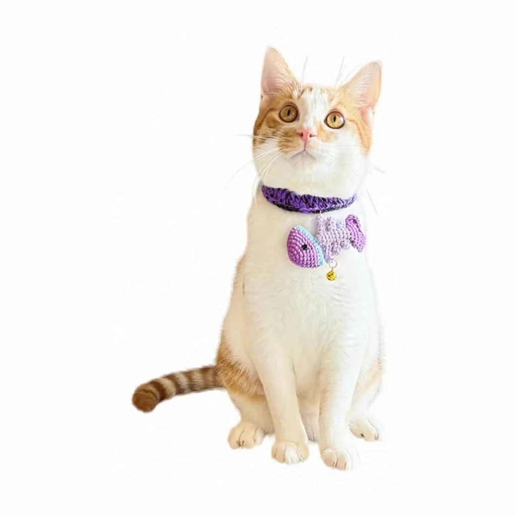 Cat wearing purple handmade Halloween collar