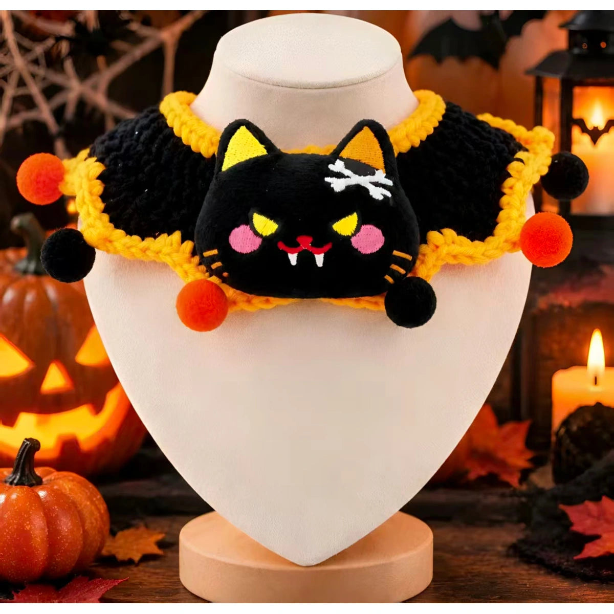 Black cat-face knit Halloween bandana laid flat