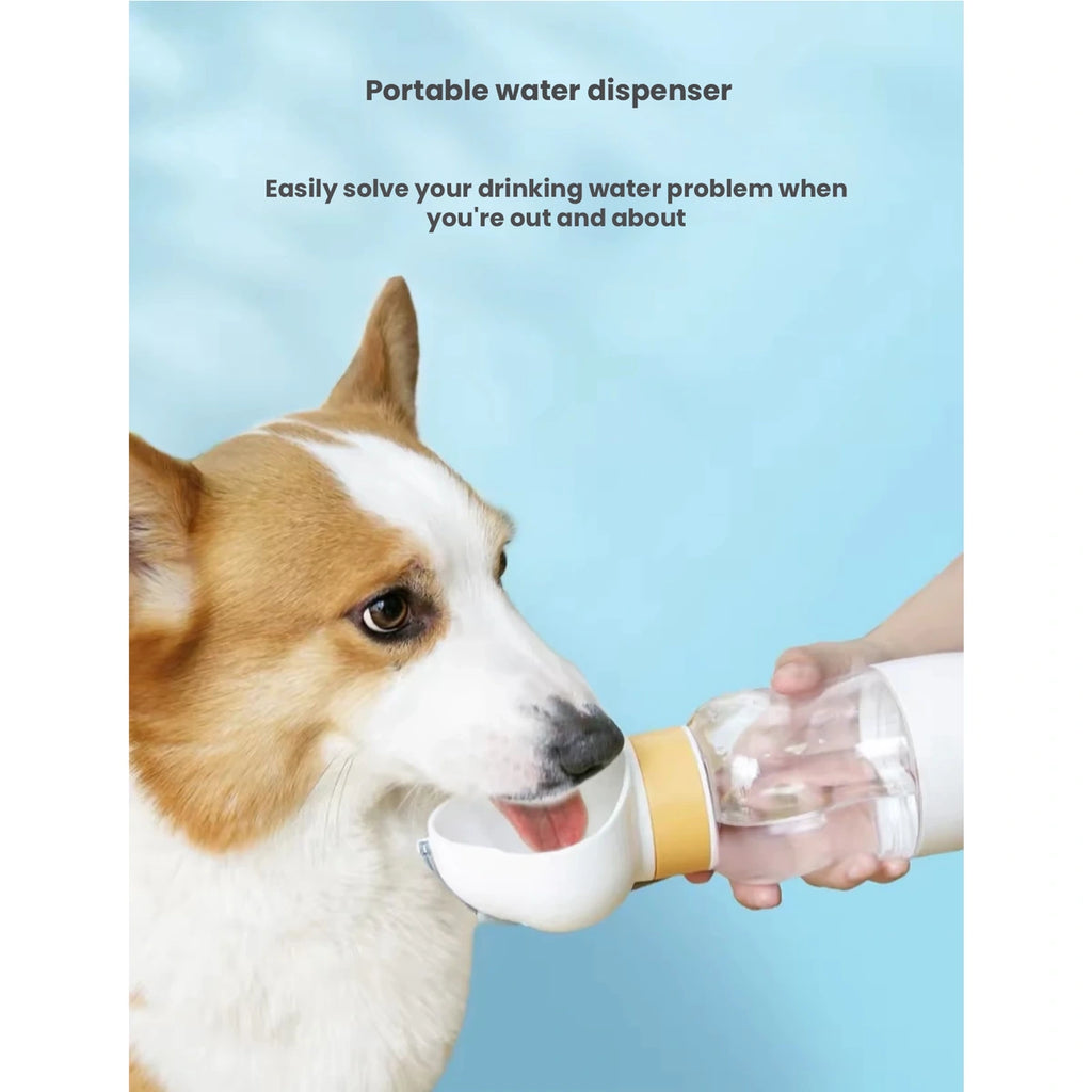 Hipidog携帯ボトルのトレーから水を飲む犬