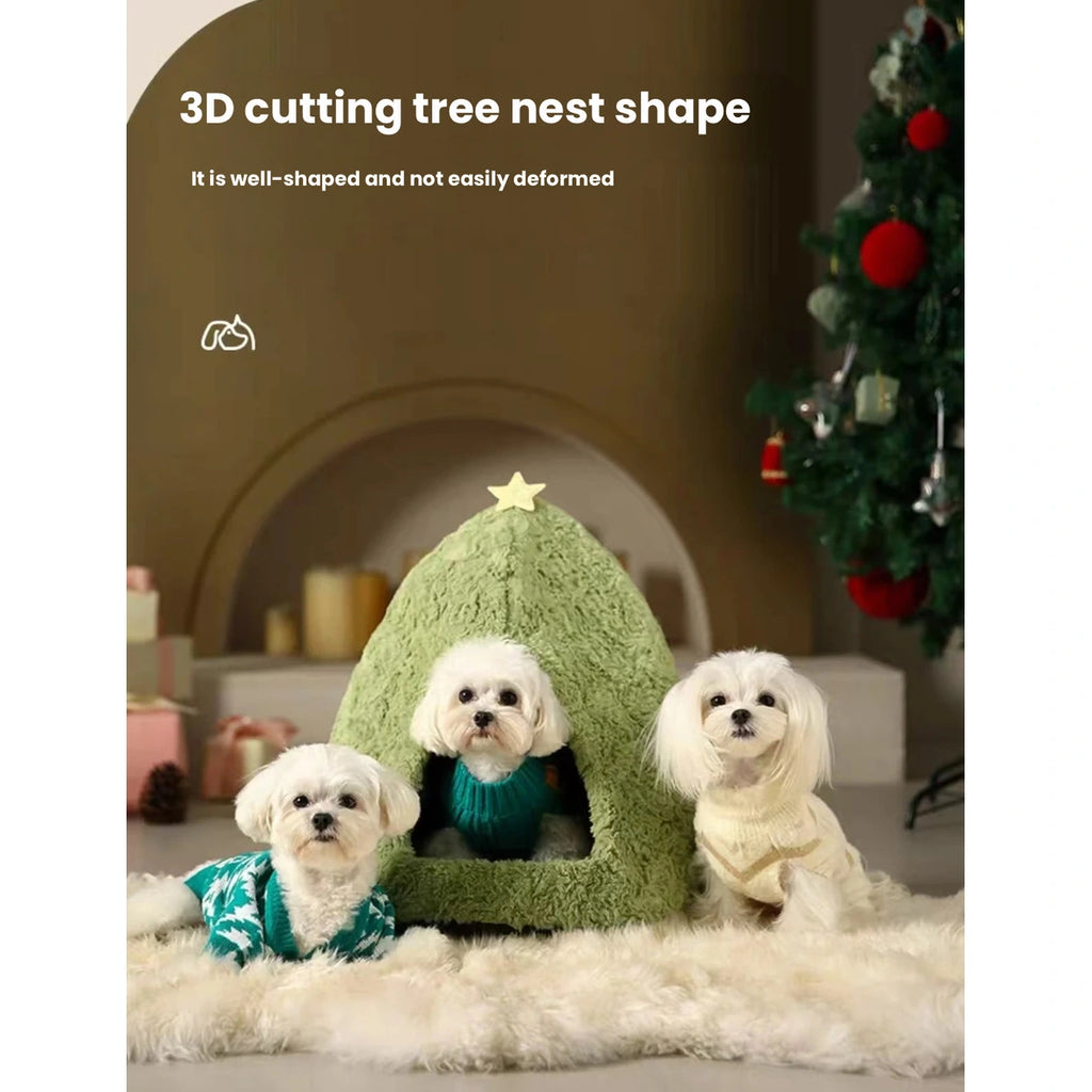 Small dogs beside the green Christmas-tree pet house