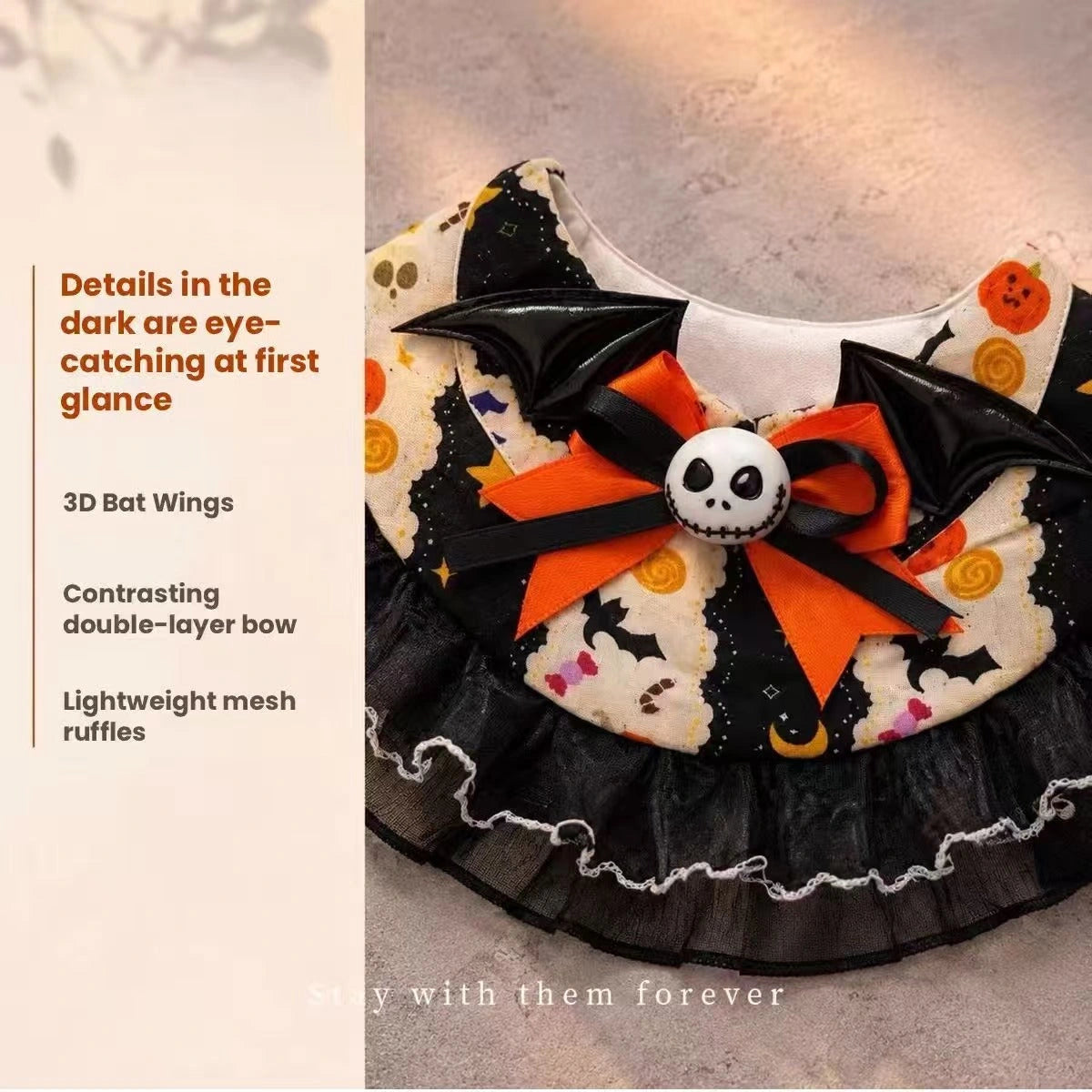 Halloween pet costume detail panel showing decorations and bib