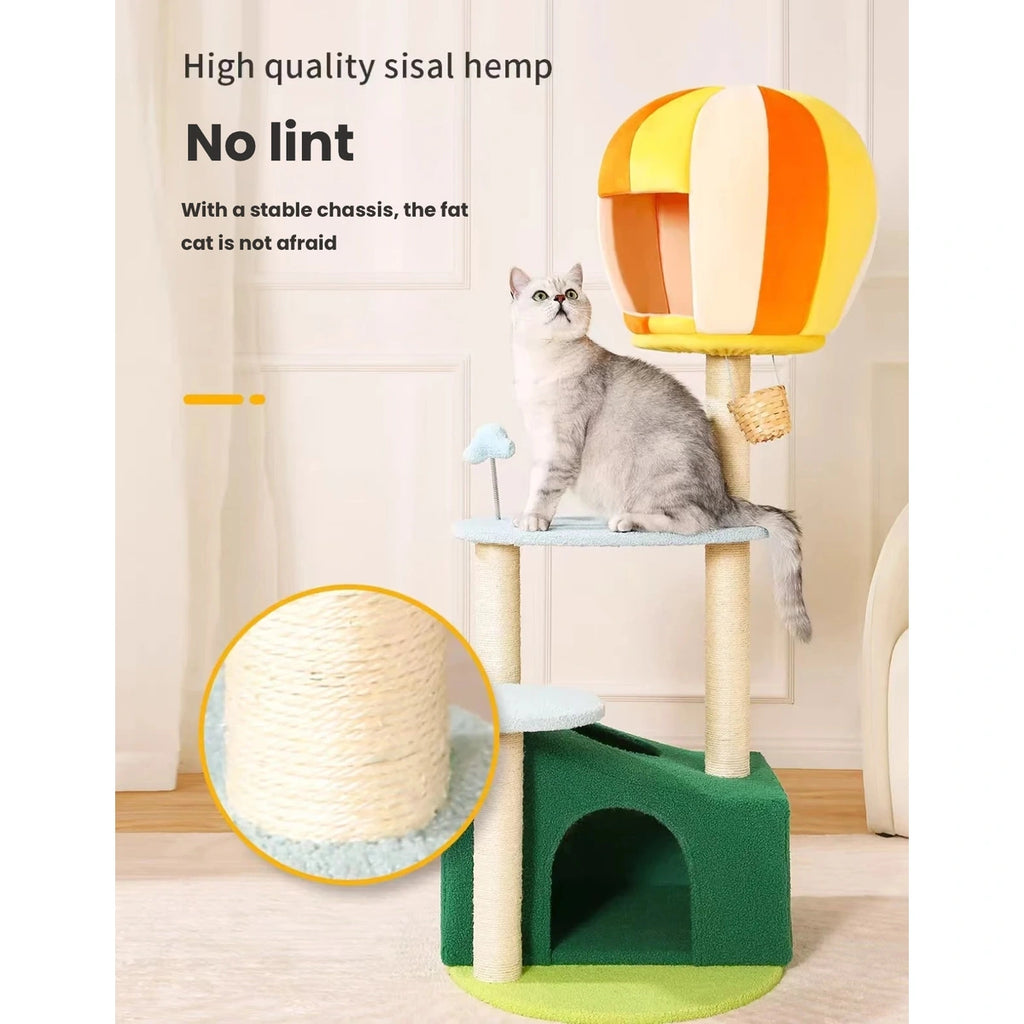 Cat using a platform on the green UFBemo cat tree