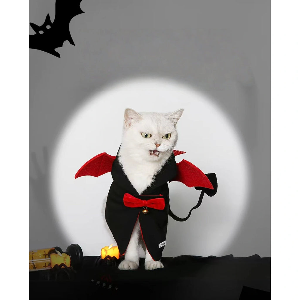 Cat wearing the black and red UFBemo devil cape