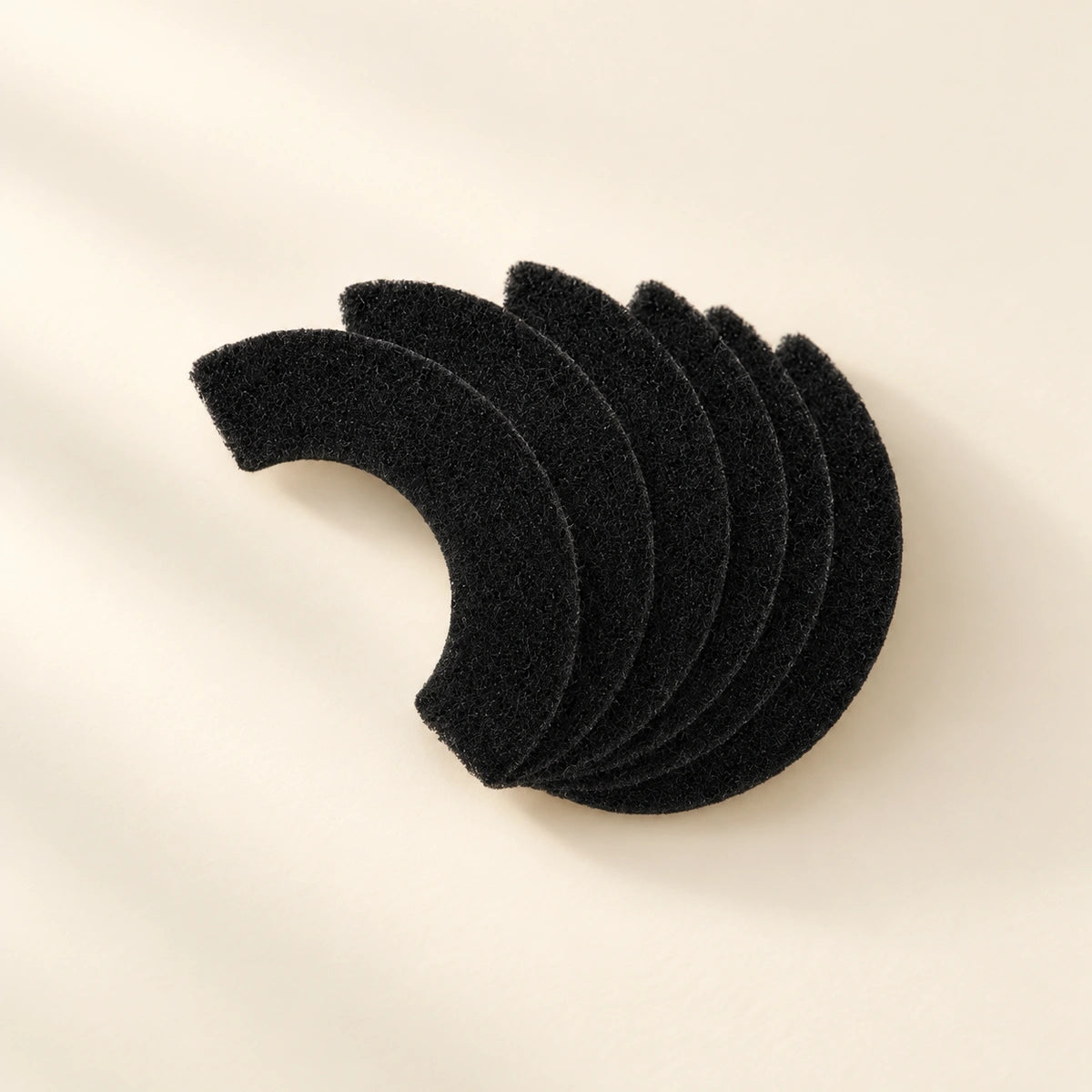 Six black replacement carbon filter pads for Litter-Robot 4