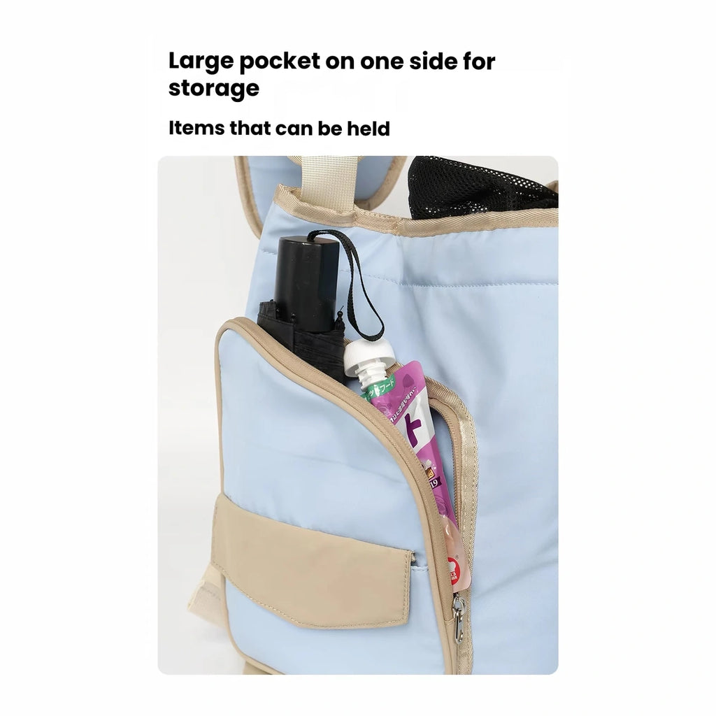 Side storage pocket on blue pet carrier bag
