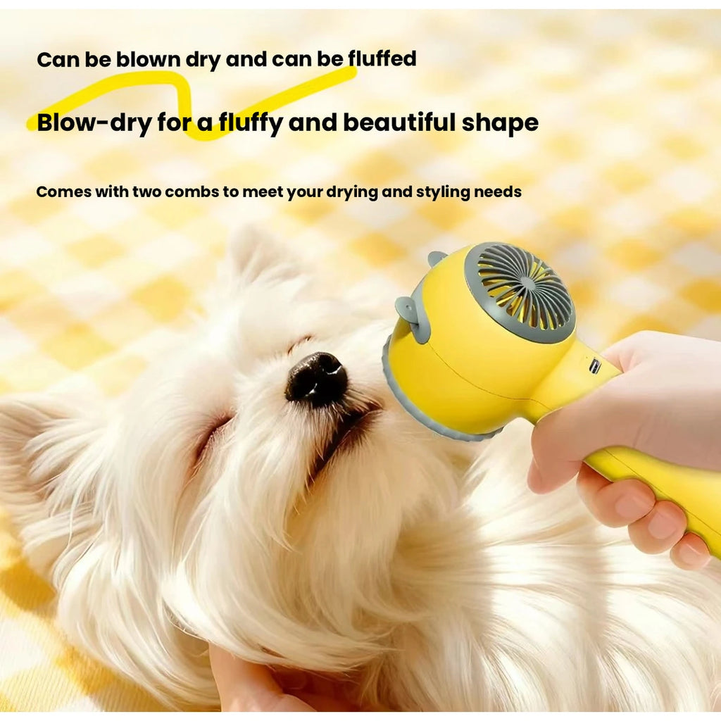 Yellow pet dryer applied to long-haired small dog