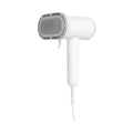 White handheld dog hair dryer with removable brush head