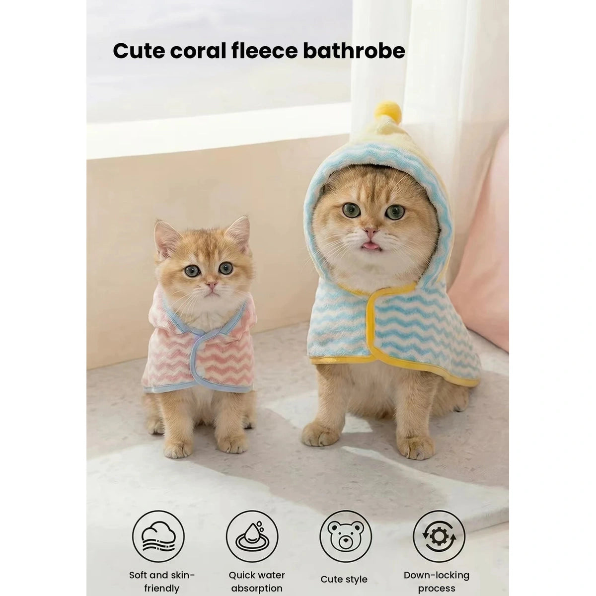 Cats wearing pink and blue hooded pet bathrobes