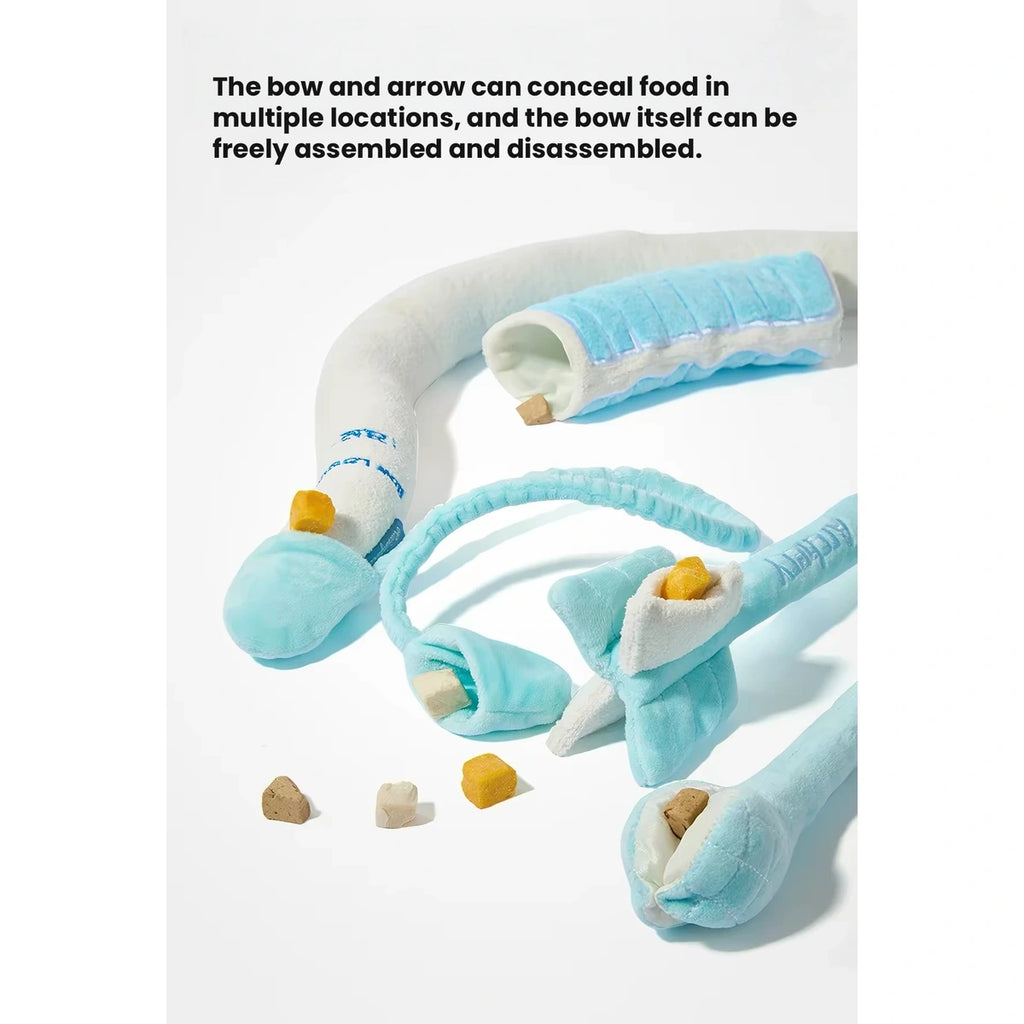 Raisingwell bow toy opened to show treat pockets and fabric sections