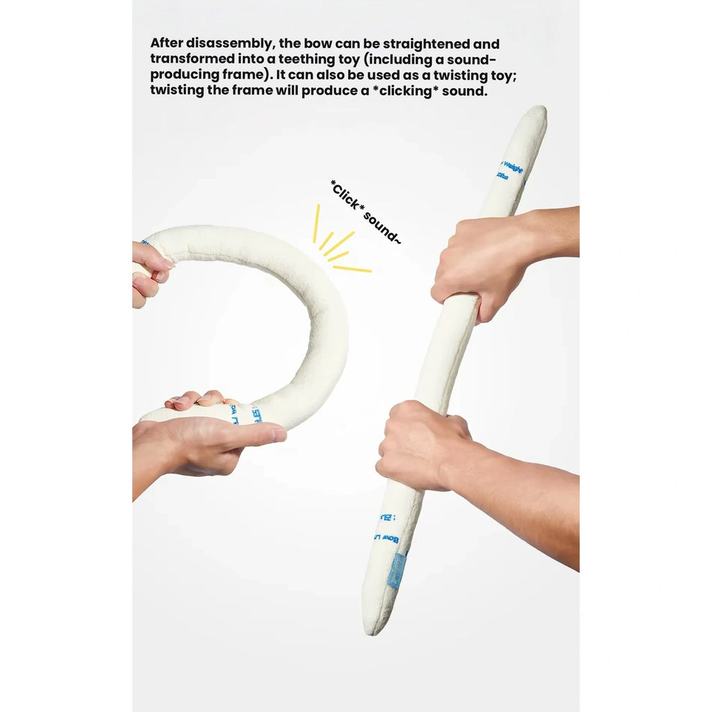 Hands separating the sections of a Raisingwell plush dog toy