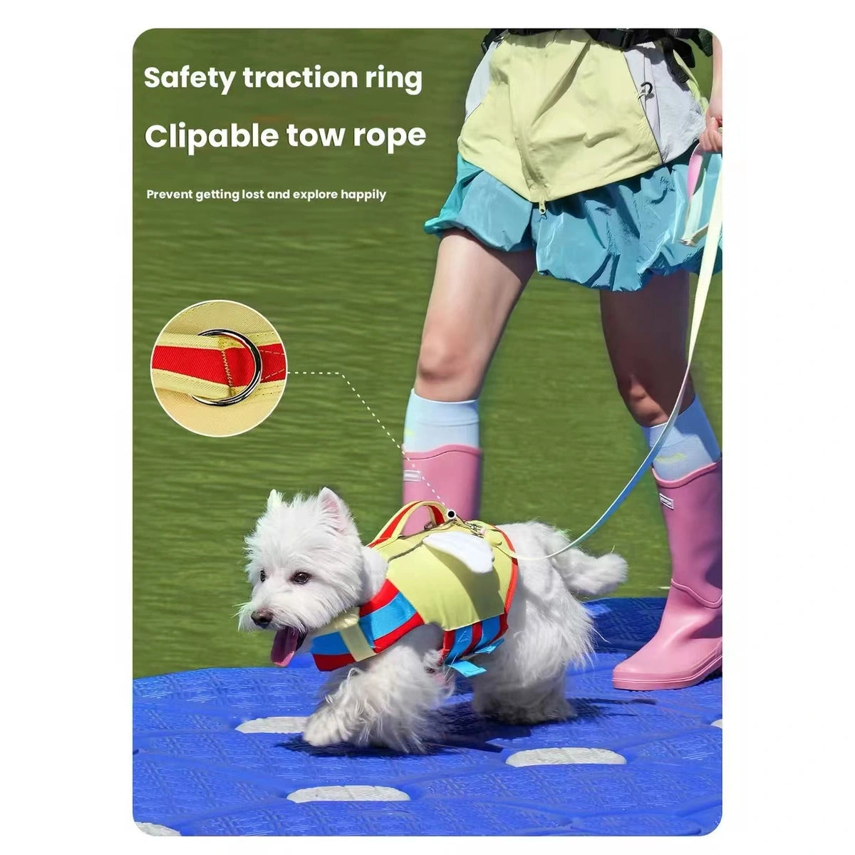 トップハンドルとリードリングが付いた Touchdog ベストを着た犬を示しています