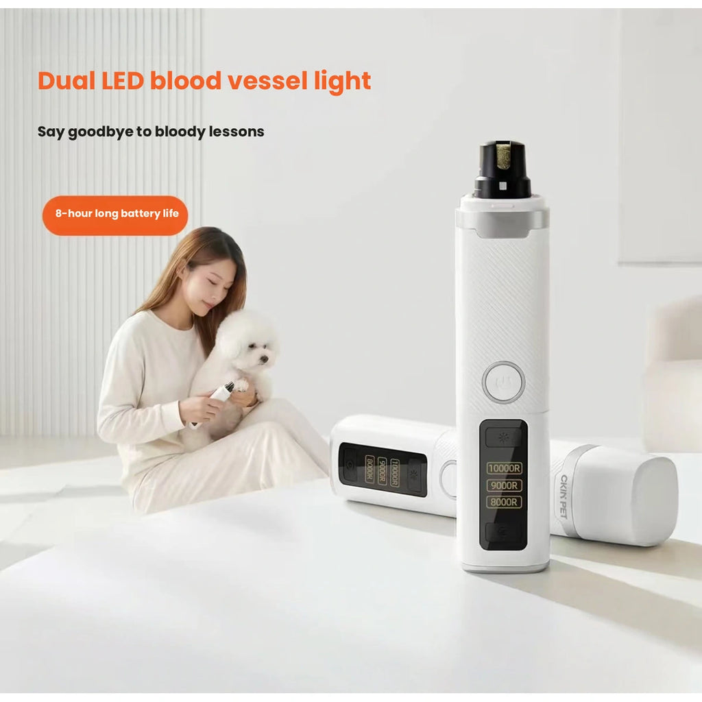 Ckin Pet nail grinder with LED light beside a dog