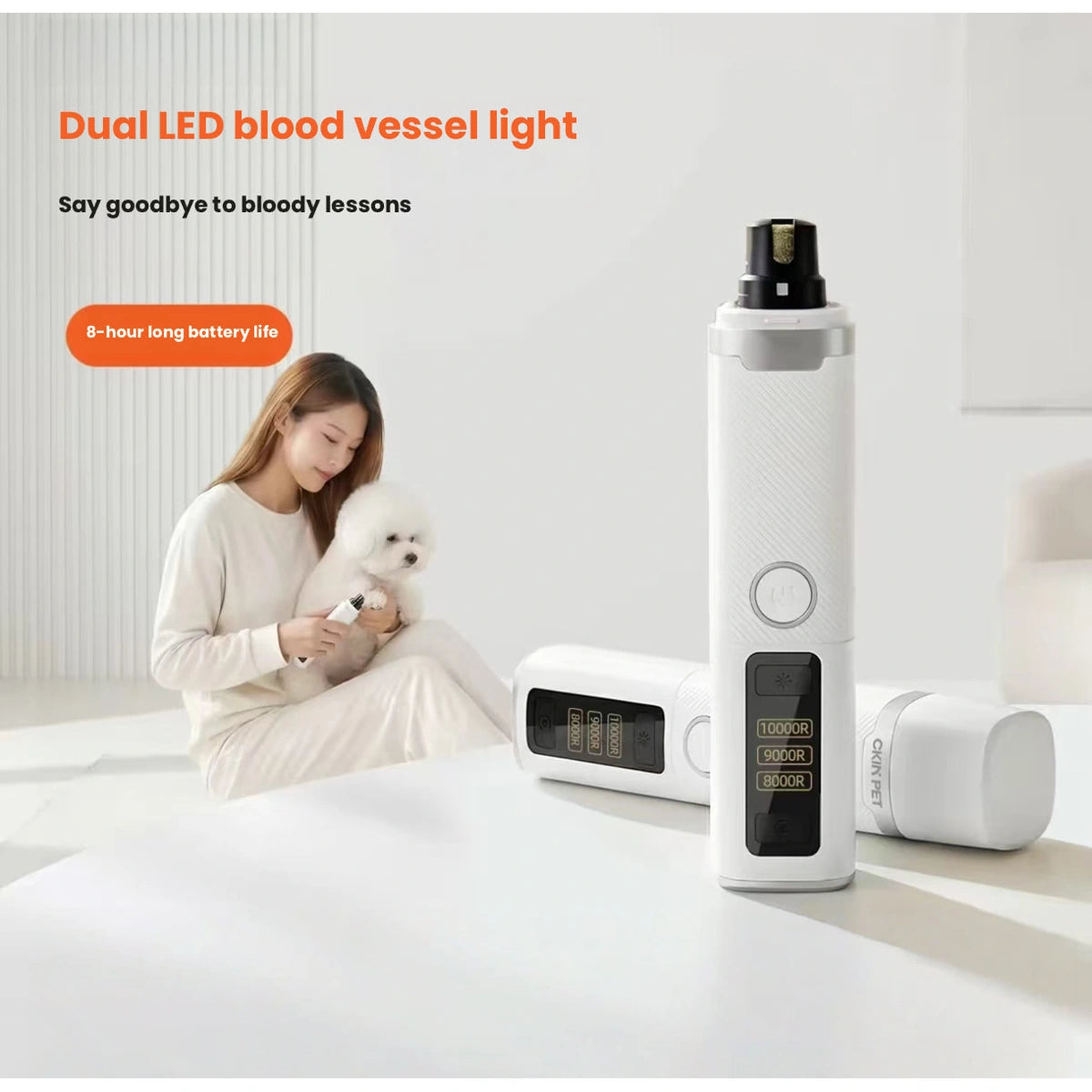 Ckin Pet nail grinder with LED light beside a dog