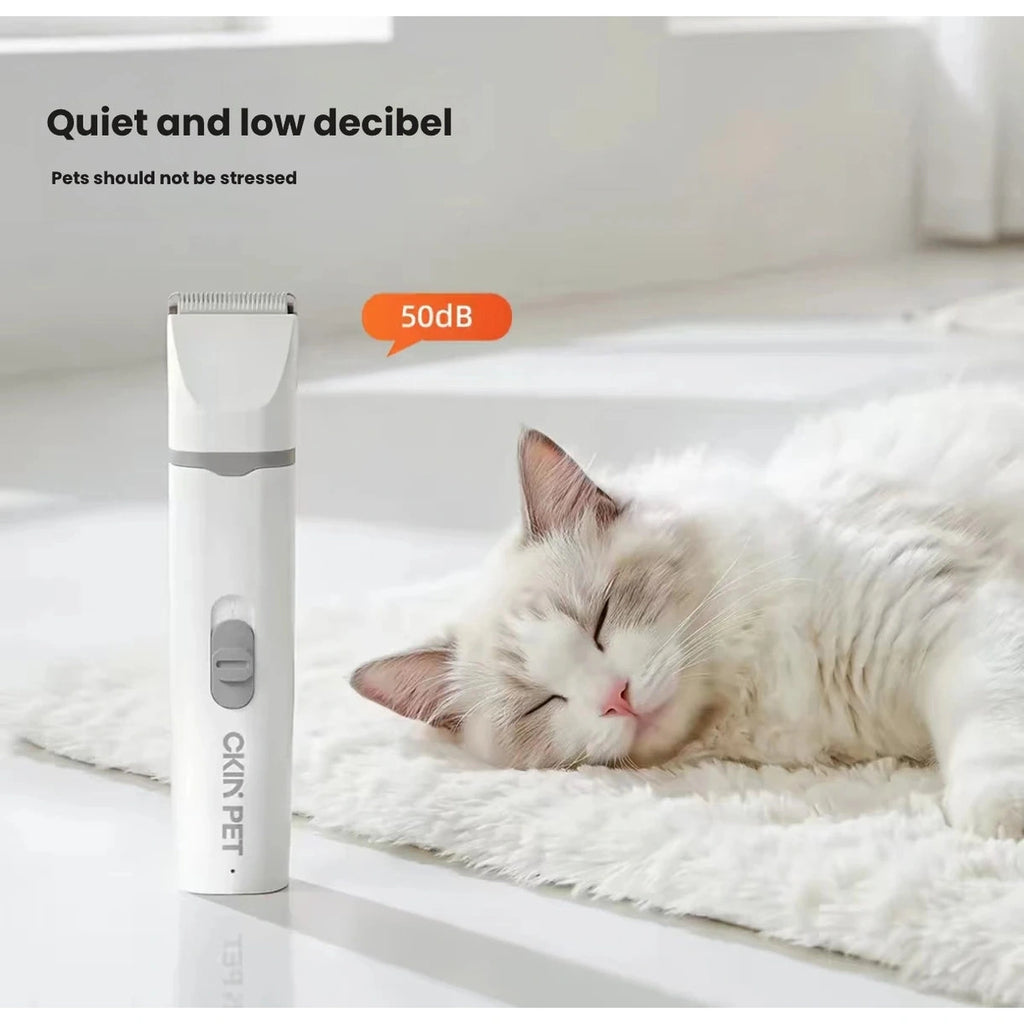 休んでいる猫の横にある Ckin Pet クリッパー ノイズ グラフィック