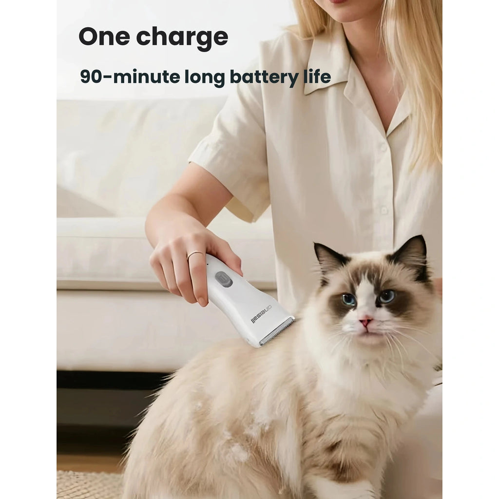 Oneisall pet trimmer: person using white pet trimmer on cat