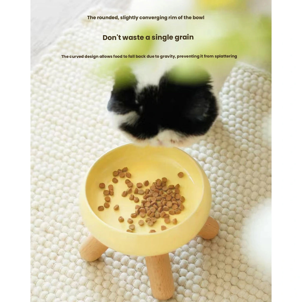 Meoof Gulu pet bowl: cat beside yellow ceramic pet bowl