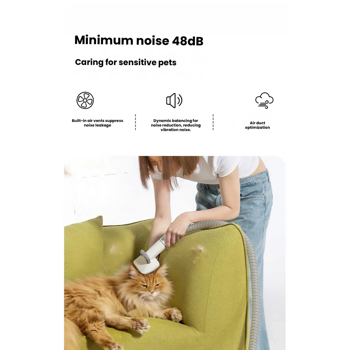 Neakasa pet grooming vacuum used to brush a dog on a sofa