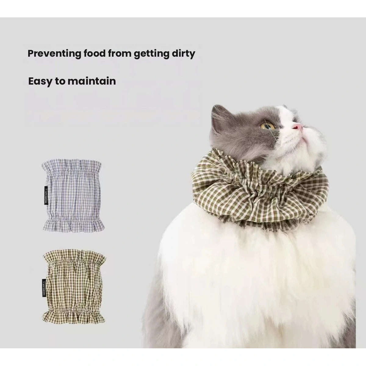 Cat wearing the HiDREAM checked feeding bib