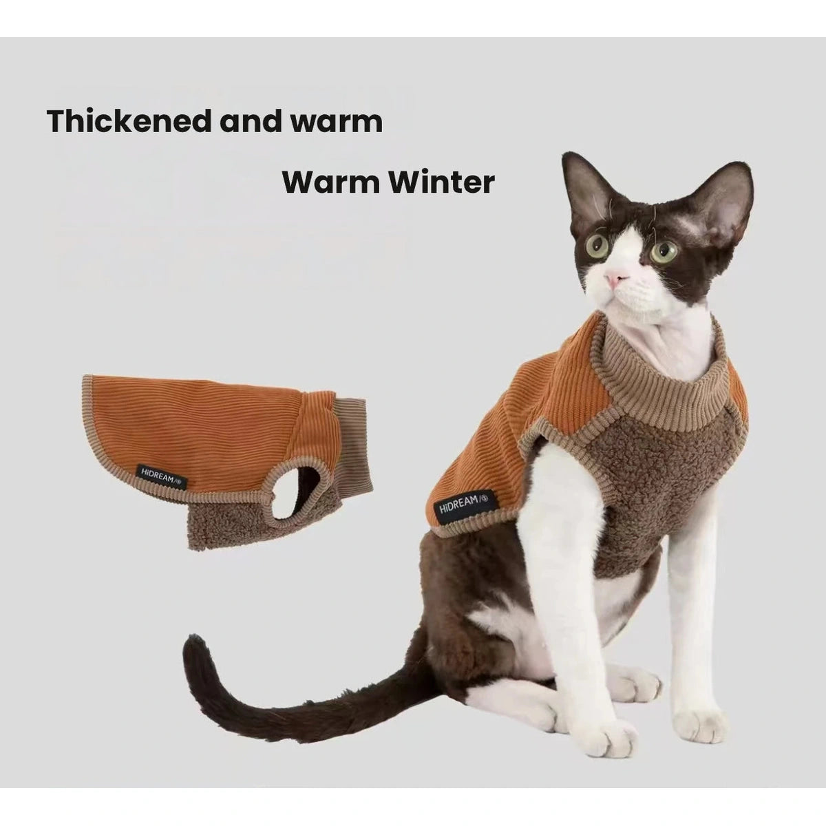 Cat sitting in a brown HiDREAM sleeveless vest