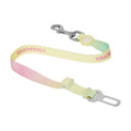 Yellow and pink Touchdog dog car restraint strap with metal clip and seat-belt-style fitting