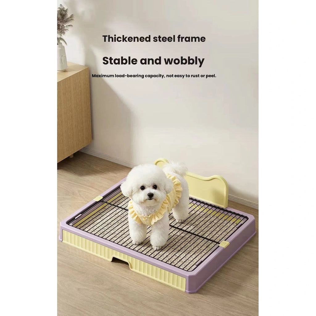 Small dog standing on the KIMPETS potty grate