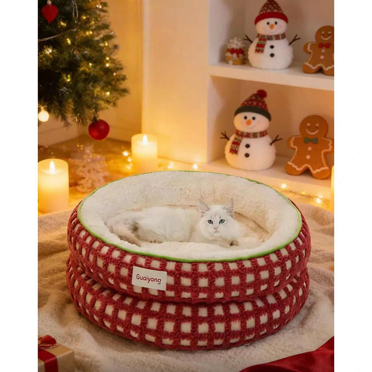 Cat resting inside a red checked HiDREAM bed
