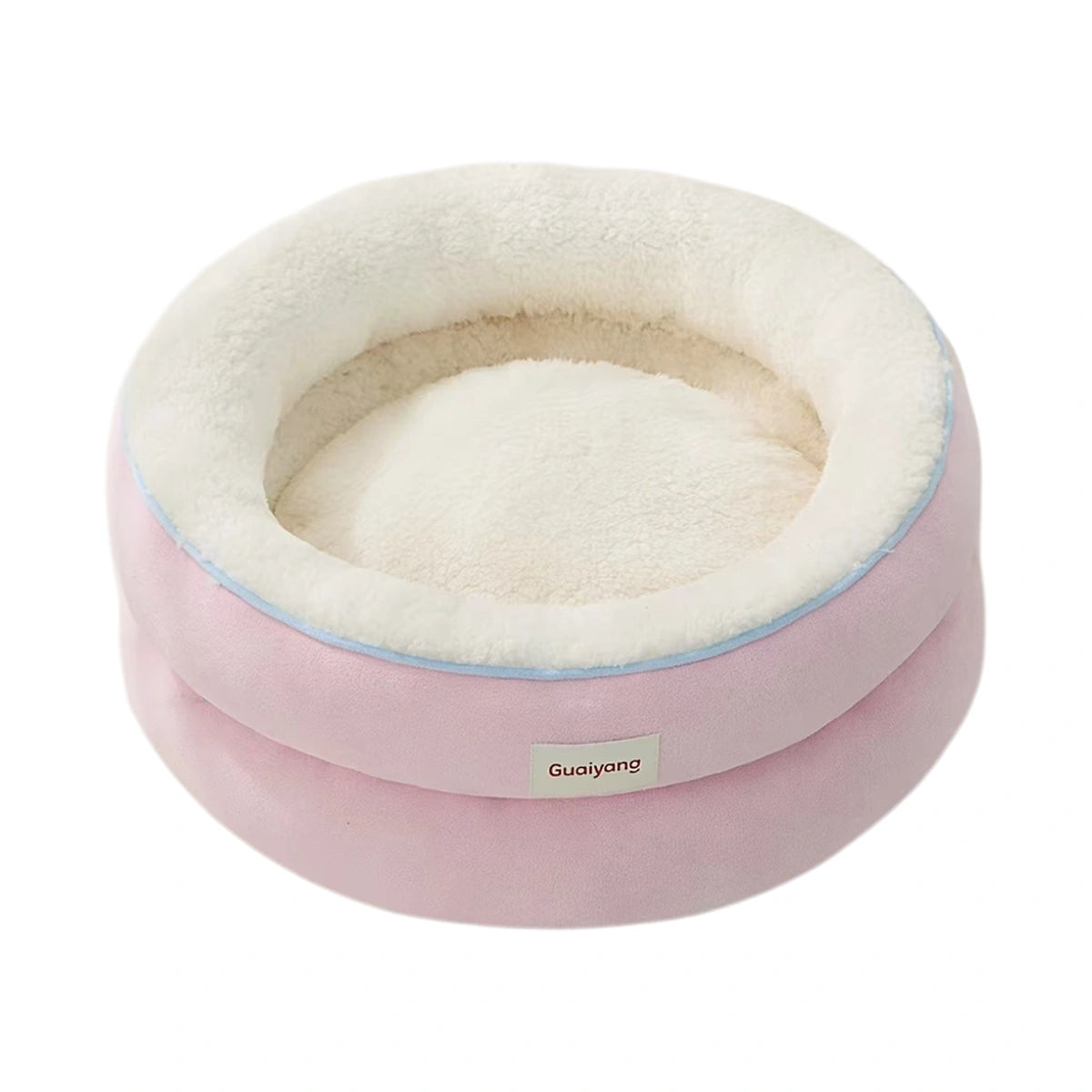 Pink HiDREAM round pet bed with a cream interior