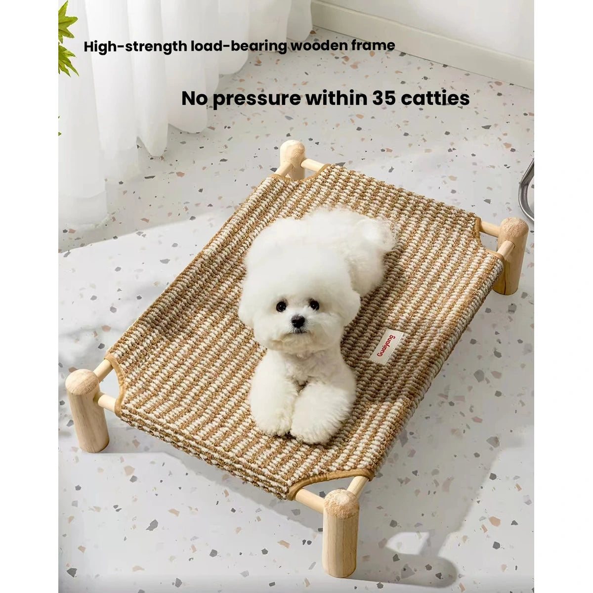 White dog on a suspended tan pet cot
