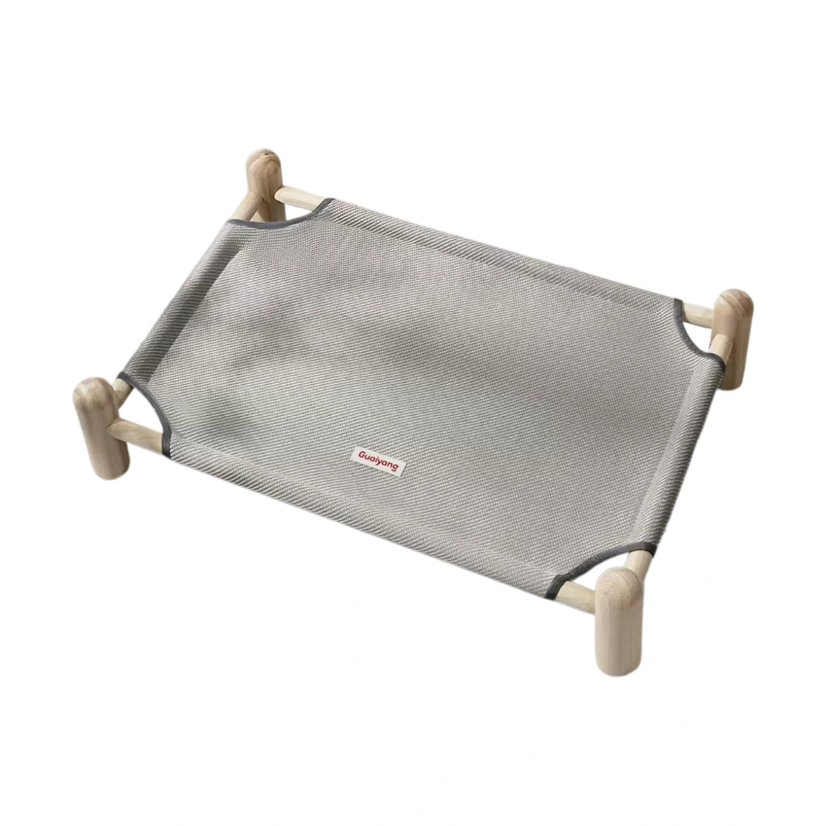 Grey fabric pet cot with four corner posts