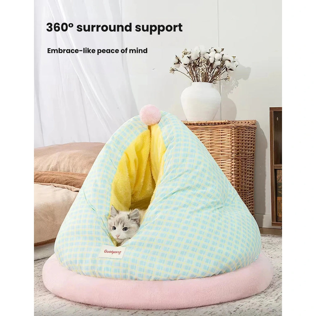 Mint and cream checked cat bed with a pink base