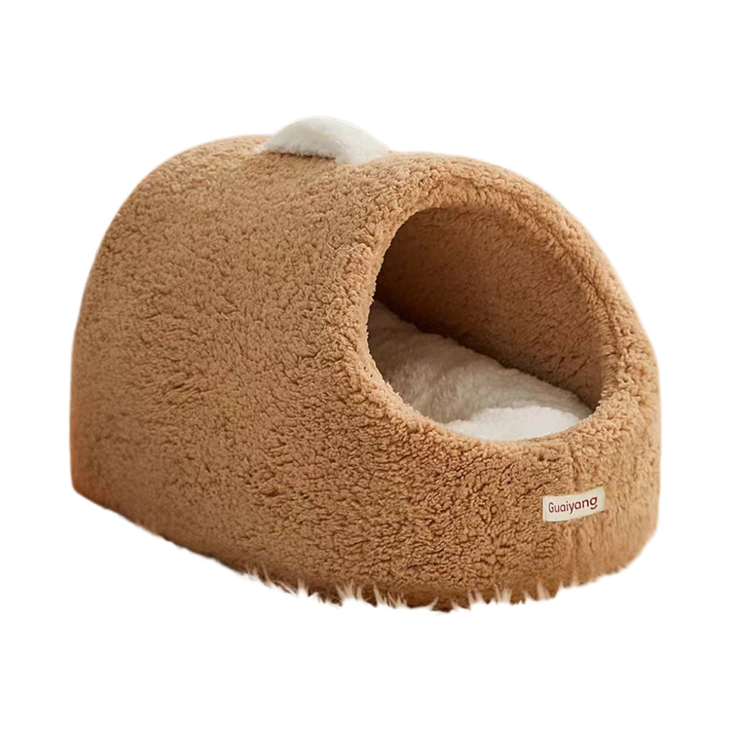 Brown plush cat cave bed with a rounded entrance and pale interior