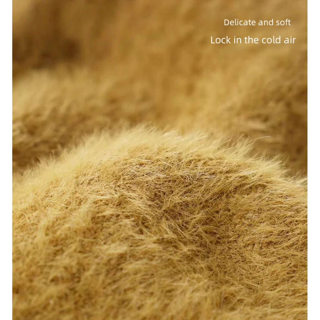 Close-up of the mustard plush fabric on a Petstar pet sweater