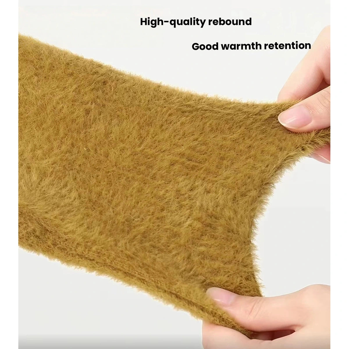 Hands stretching the mustard plush fabric of the Petstar sweater vest