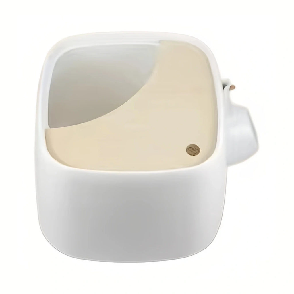 inFluffy enclosed litter box with pale wooden lid and white base